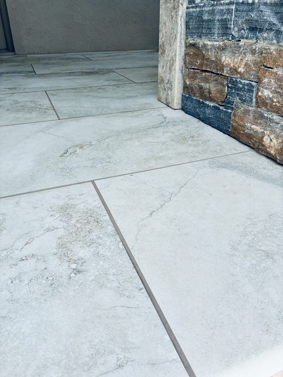 Close-up detail of porcelain paver texture and stonework